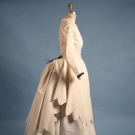 WHITE PROMENADE DRESS, LATE 1860s