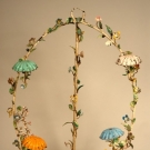 OVAL MIRRORED HAT DISPLAY STAND, MID 20th C