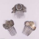 THREE ORNATE METAL HAIR COMBS, 1850 - 1900