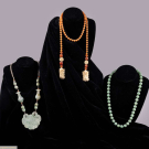 THREE CARNELIAN OR FAUX JADE NECKLACES, CHINA OR JAPAN, EARLY 20TH C