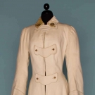 WOMAN'S MILITARY STYLE COAT, c. 1910