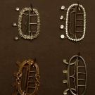 FOUR MEN'S NECK STOCK BUCKLES, 18TH C-1830s