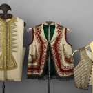 THREE WHITE WOOL FOLK VESTS, 1850-1900