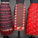 THREE WOVEN FOLK APRONS, 1875-1920