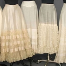 FIVE PETTICOATS, LATE 19TH C