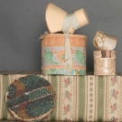 TWO DOLL BONNETS &amp; WALLPAPER BOXES, 1830-1840