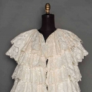 SLEEVELESS WHITE EVENING COAT, LATE 1940s