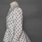 COTTON PRINT BUSTLE DRESS, 1870s