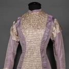 GIRL'S PURPLE STRIPE BUSTLE DRESS, 1870s