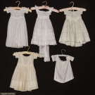 4 TODDLER'S COTTON DRESSES, MID 19TH C