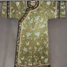 EMBROIDERED GREEN SILK ROBE, CHINA, c. 1900