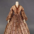 PAISLEY PRINTED PURPLE DRESS, MID 1860s