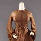 CHOCOLATE POLONAISE AFTERNOON DRESS, c. 1868
