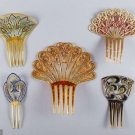 EIGHT JEWELLED PLASTIC HAIR COMBS, 1900-1920