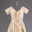 TWO CREAM WEDDING DRESSES, 1840s