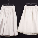 2 WHITE COTTON QUILTED PETTICOATS, LATE 19th C