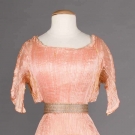 MARIANO FORTUNY PEACH PEPLOS GOWN,  EARLY 20th C.