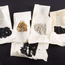 LOT OF 12 OLD STOCK BAGGED SWAROVSKI CRYSTALS, WEST GERMANY, MID 20TH C.