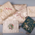 FIVE LADIES EMBROIDERED SILK CASES, 1880-1920