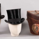 TWO AMERICAN TOP HATS, ONE WITH LEATHER BOX, 1860s