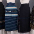 FOUR REGIONAL APRONS, EASTERN EUROPE, MID 20TH C
