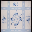 PAIR OF BLUE ON WHITE APPLIQUE QUILTS, 1930-1940s