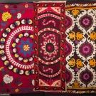 THREE EMBROIDERED SUZANIS, CENTRAL ASIA, 20TH C