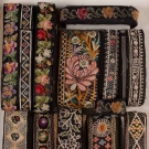 THIRTEEN EMBROIDERED SARI BORDERS &amp; RIBBONS, INDIA &amp; CHINA, c. 1900