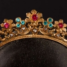 NINE JEWELED BRASS CORONETS, 1930s