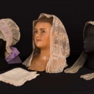 THREE LACE OR EMBROIDERED BONNETS, EARLY-MID 19TH C.