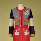 MOSCHINO LEATHER SKIRT SUIT, LATE 20th C