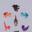 SEVEN PAVONE CAT BROOCHES, PARIS